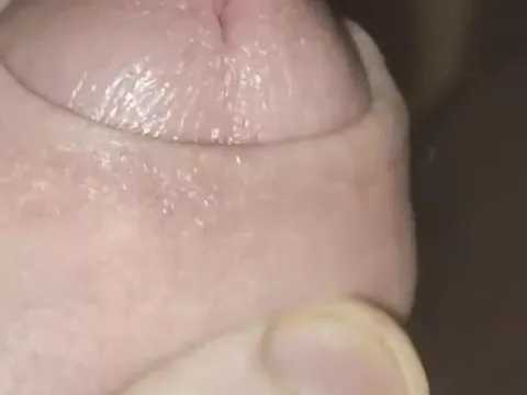 Foreskin play zoom closeup